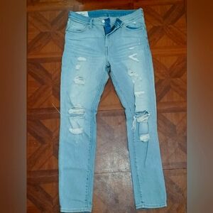 Distressed Light Blue Denim Jeans